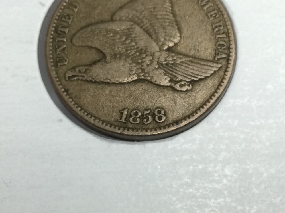 1858/1857 Flying Eagle Cent double date in very fine