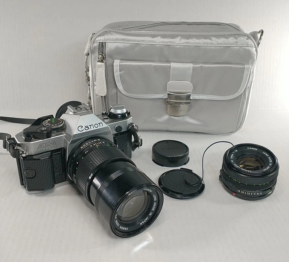 Canon AE-1 Program 35mm Camera Bundle With 50mm / 135 Lens Strap & Camera Bag