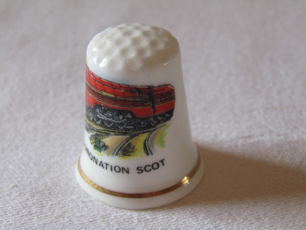 BONE CHINA THIMBLE FEATURING THE TRAIN CORONATION SCOT.
