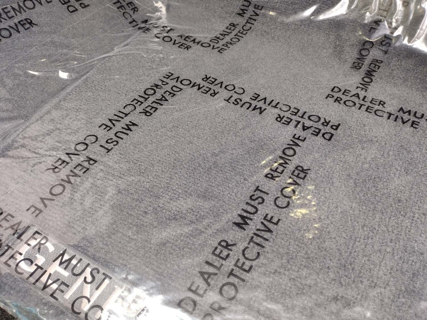 Adhesive Plastic "Dealer Must Remove" Car Floor Mats 3 MIL 24 IN x 200 FT Roll