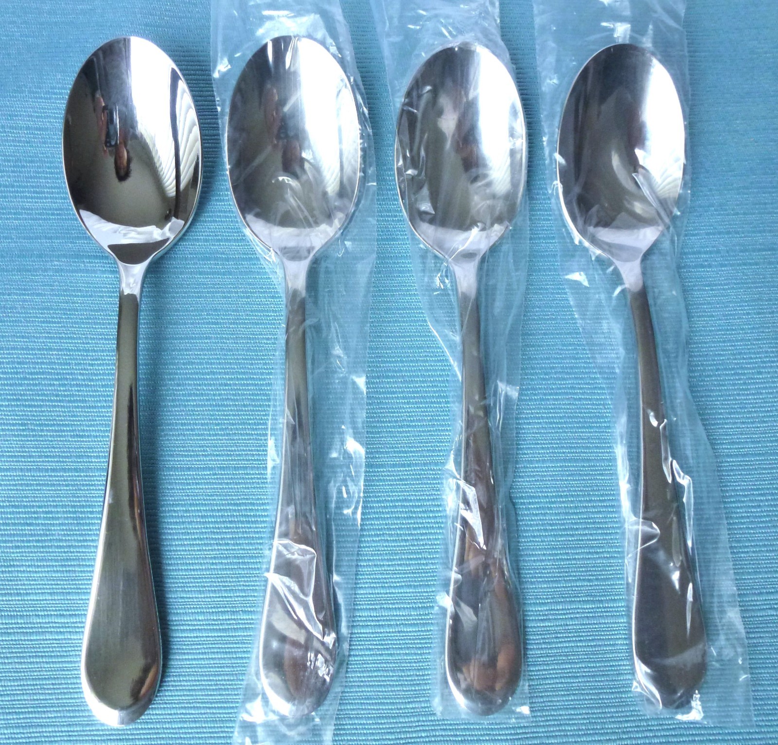 New Oneida ICARUS Glossy Set of 4 Teaspoons Stainless Flatware (5 7/8")