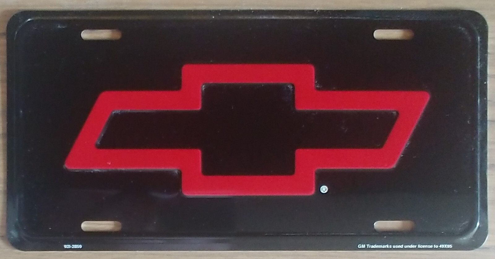 Vintage Chevy License Plate Red Bowtie Bow-Tie Embossed Auto Tag Metal Old Stock