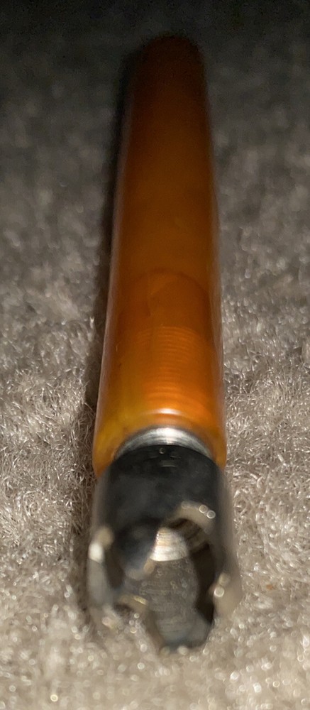 Vtg Butterscotch Bakelite handled tool?