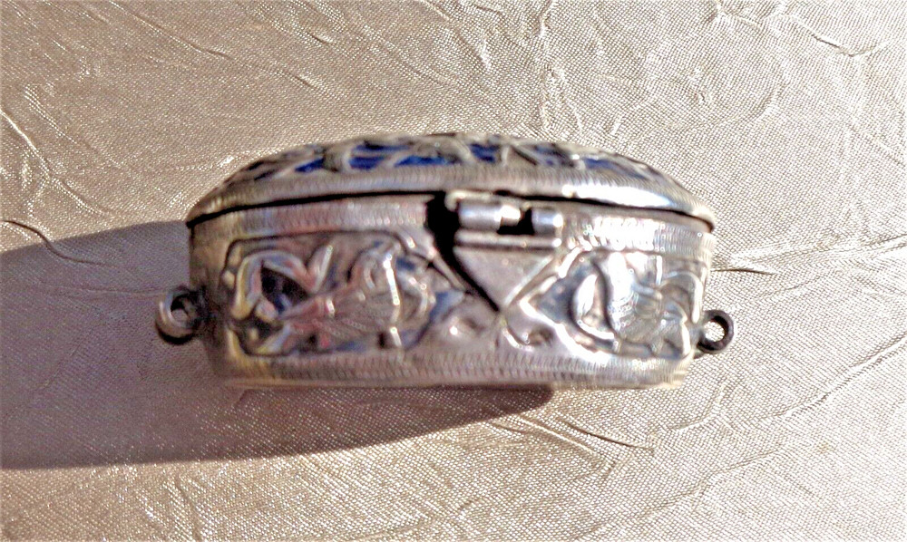 ANTIQUE SMALL OVAL ISLAMIC MIDDLE EASTERN SILVER BOX, EMBOSSED & ENAMELED