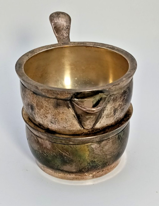 Silver plated stackable creamer and sugar set .