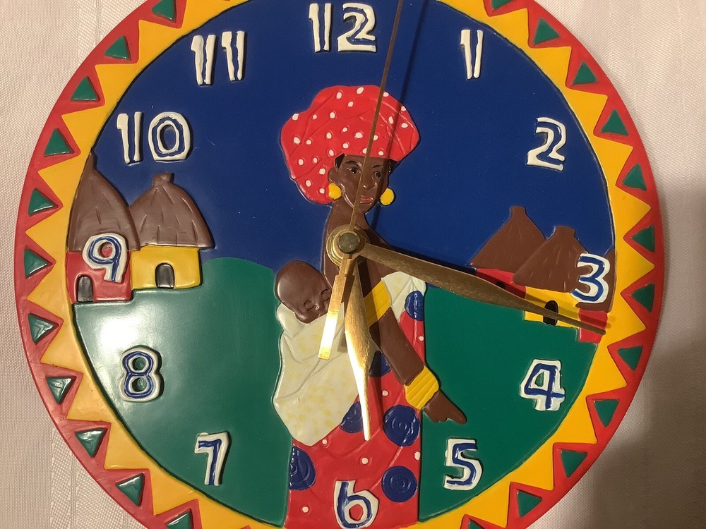 Avon African Village Clock