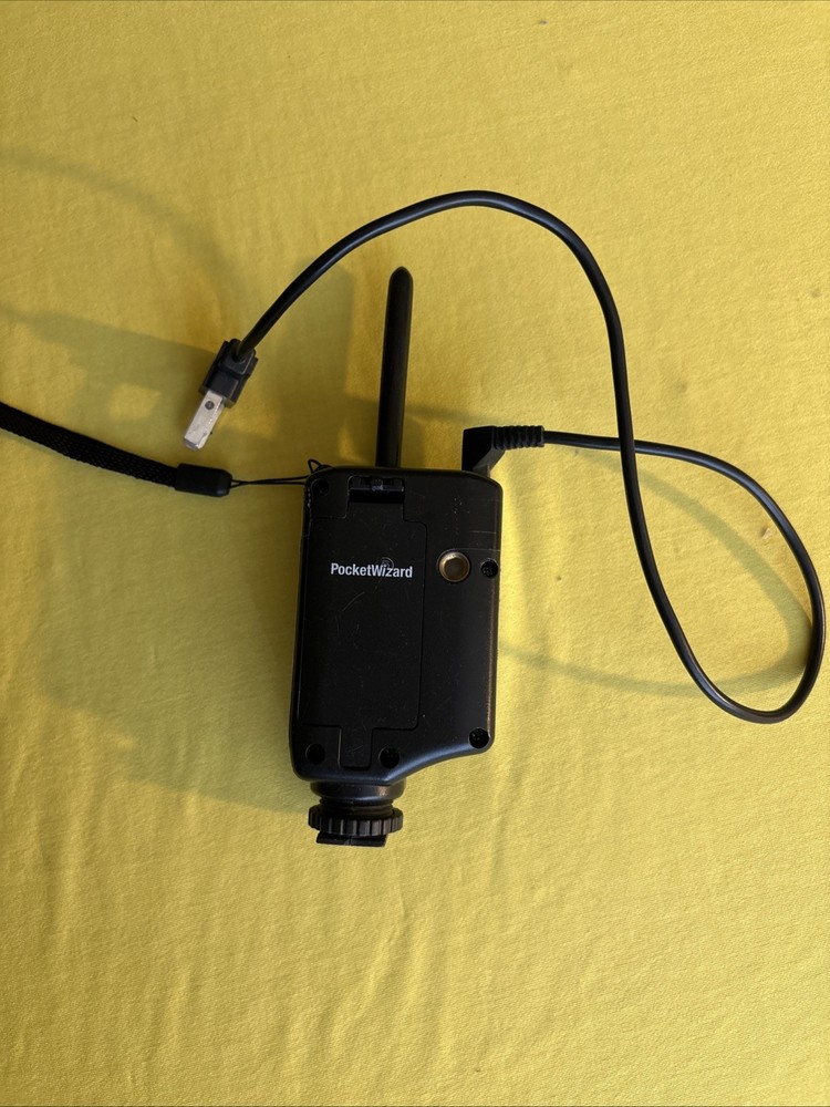 PocketWizard Plus II Transceiver Plus Stroboframe And Neewer Remote.