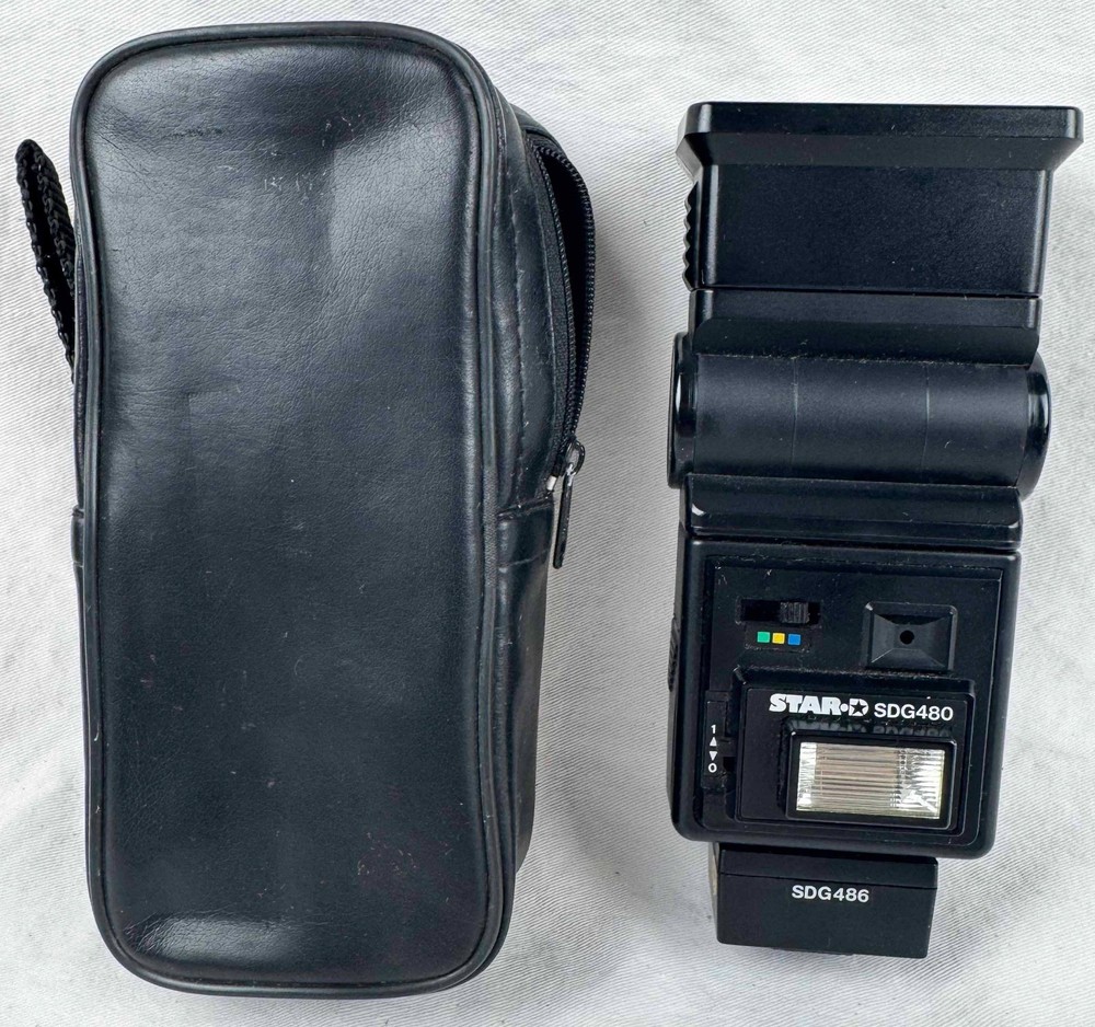 STAR-D SDG-480 camera flash with case. Tested and works.