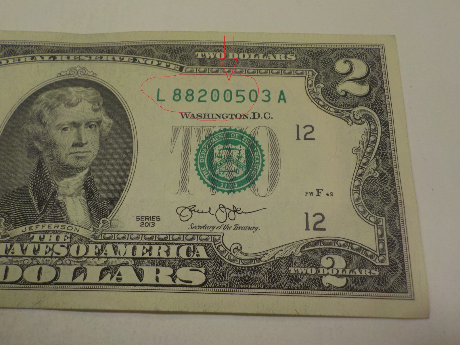 UNC $2 INK ERROR BOTH SERIAL NUMBER 0s & 8s FILLED IN L88200503A TWO DOLLAR BILL
