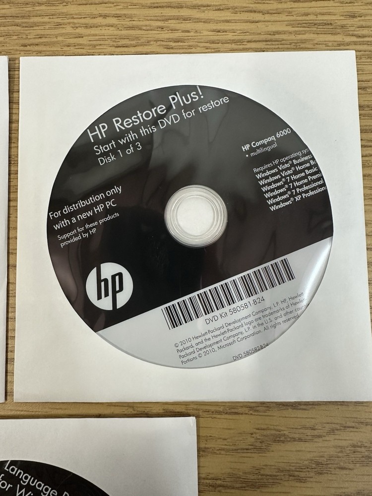 HP Restore Plus! Microsoft Windows 7 Professional Recovery DVD'S (3)