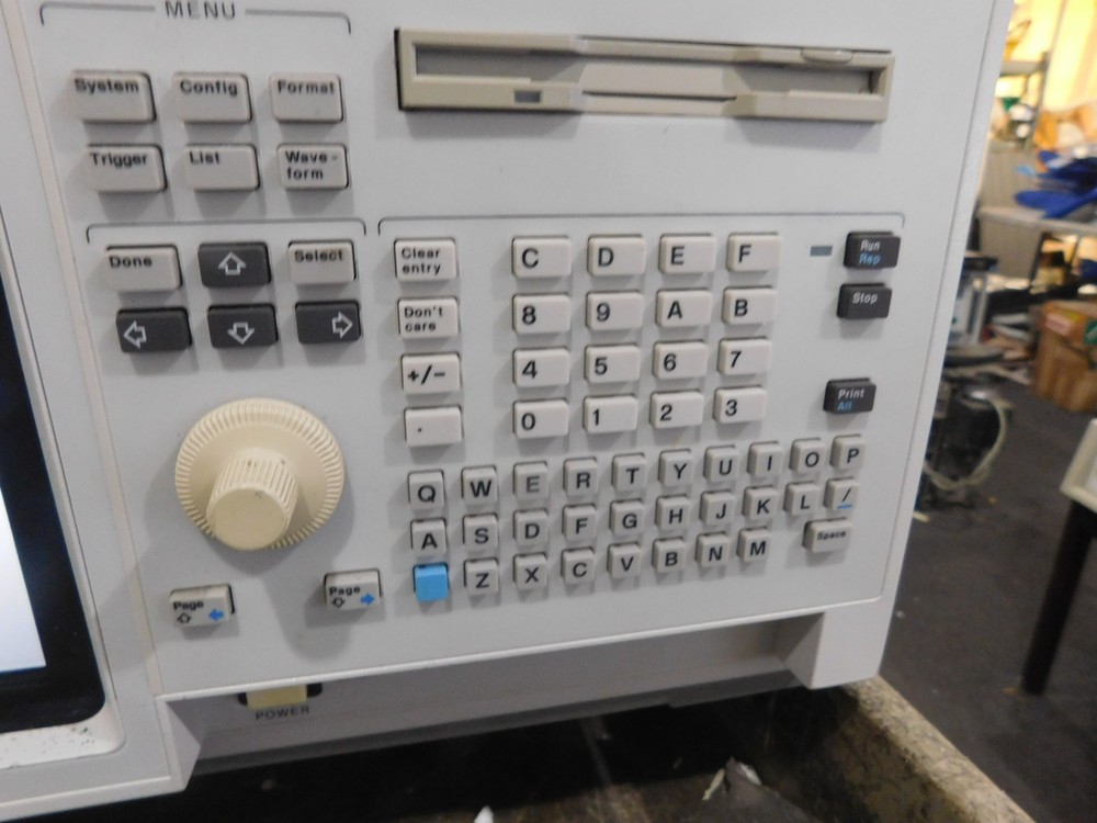 Hewlett Packard Model: 1670E Logic Analyzer with Accessories Pictured