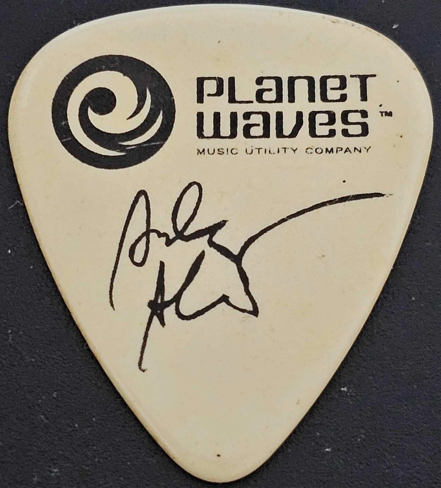 Andy Aledort white guitar pick