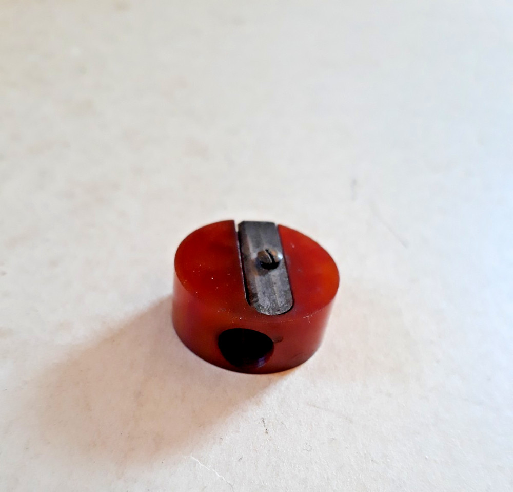 Vtg Bakelite Dark Orange Pencil Sharpener - Round