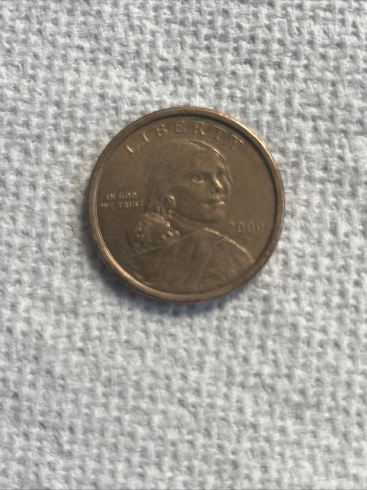 2000 D Sacagawea one dollar coin "wounded eagle" error coin .