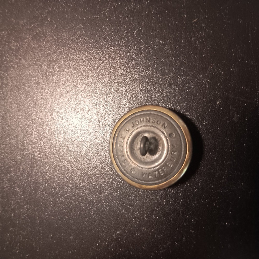 Fire department brass uniform buttons