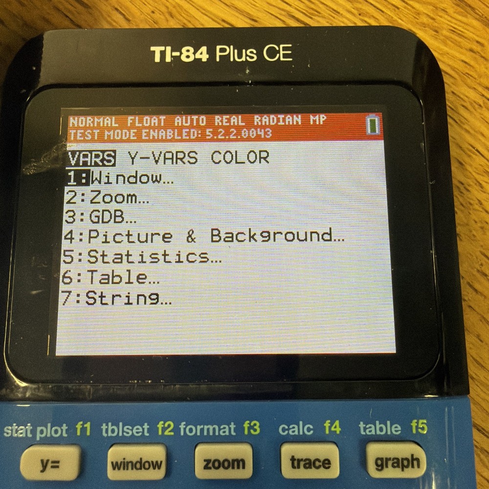 Texas Instruments TI-84 Plus CE Graphing Calculator - Blue With Case