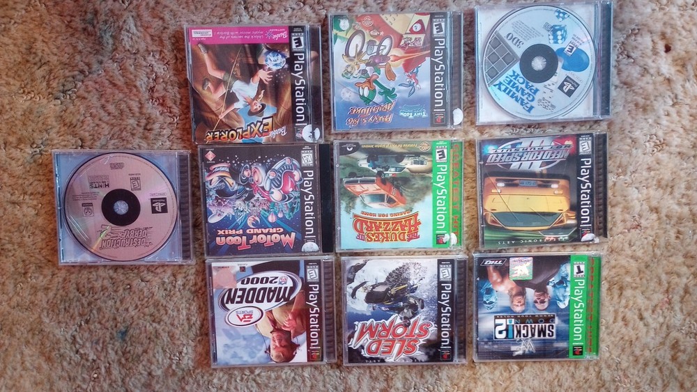 PlayStation 1 console with games