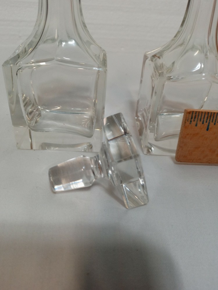 Two 4in Clear Glass Bottles One Stopper
