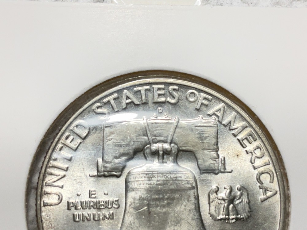 1958 D Franklin Half Dollar UNC.