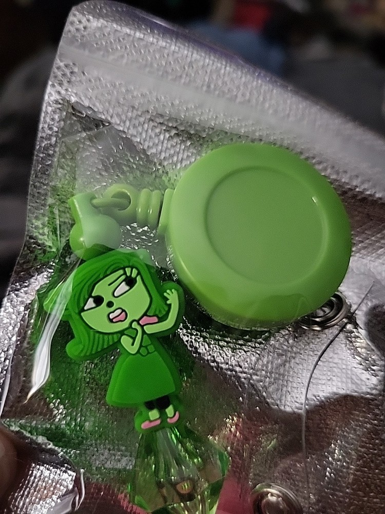 Inside Out Character Green Badge Reel