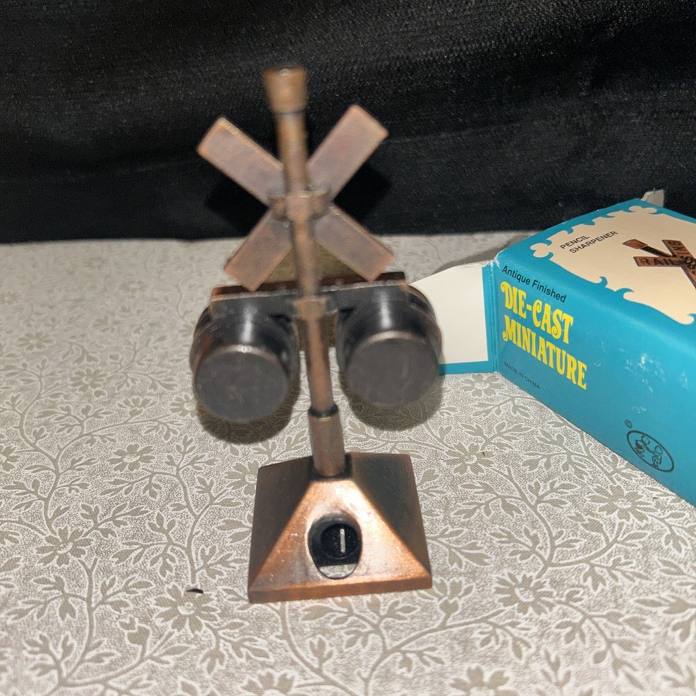 vintage die cast miniature pencil sharpener
