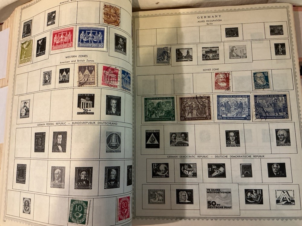 The New World Wide Postage Stamp Album with Over 775 Stamps See Photos