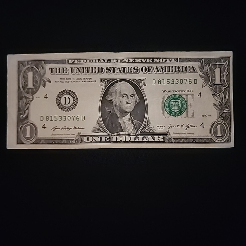 ERROR MISALIGNED MISCUT. ONE DOLLAR BILL