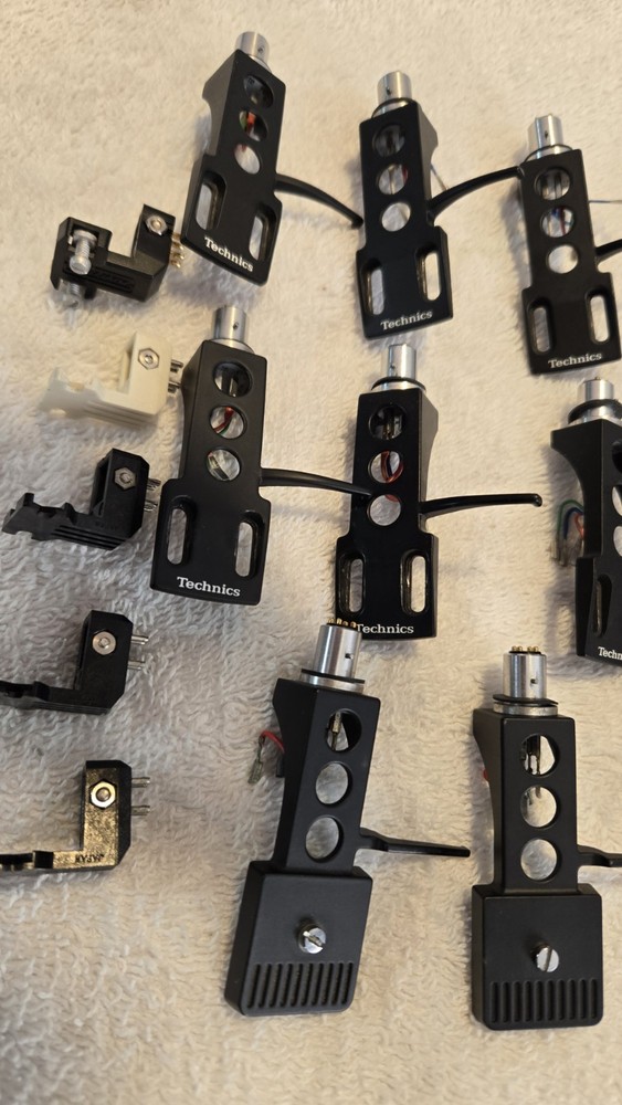 13 Turntable Headshells. 12 OEM Technics, One Pickering. Five P-Mount Adapters