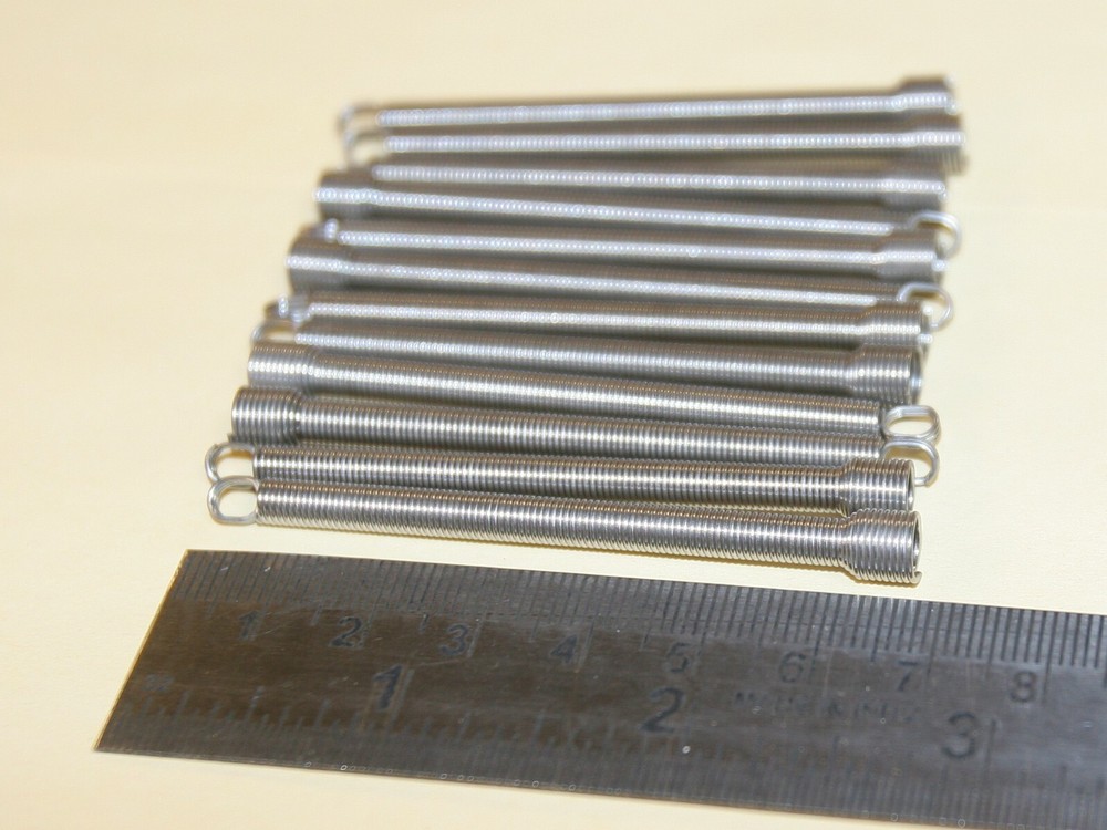 ESD coin chute return spring replacements - 12 pack - part no. 20963