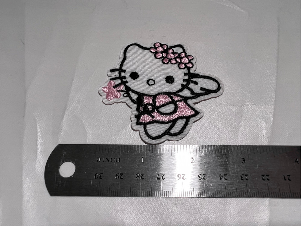 Hello Kitty as a Fairy with Flowers Iron on Patch