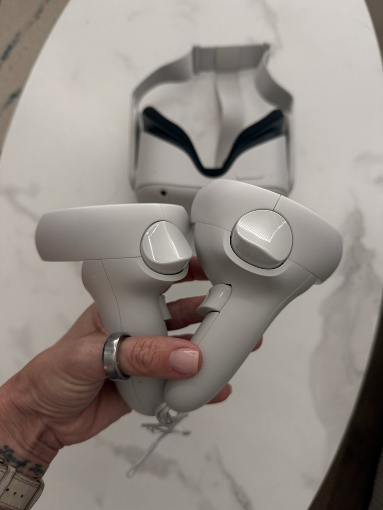 Meta Quest 2 All-In-One VR Headset with its controllers