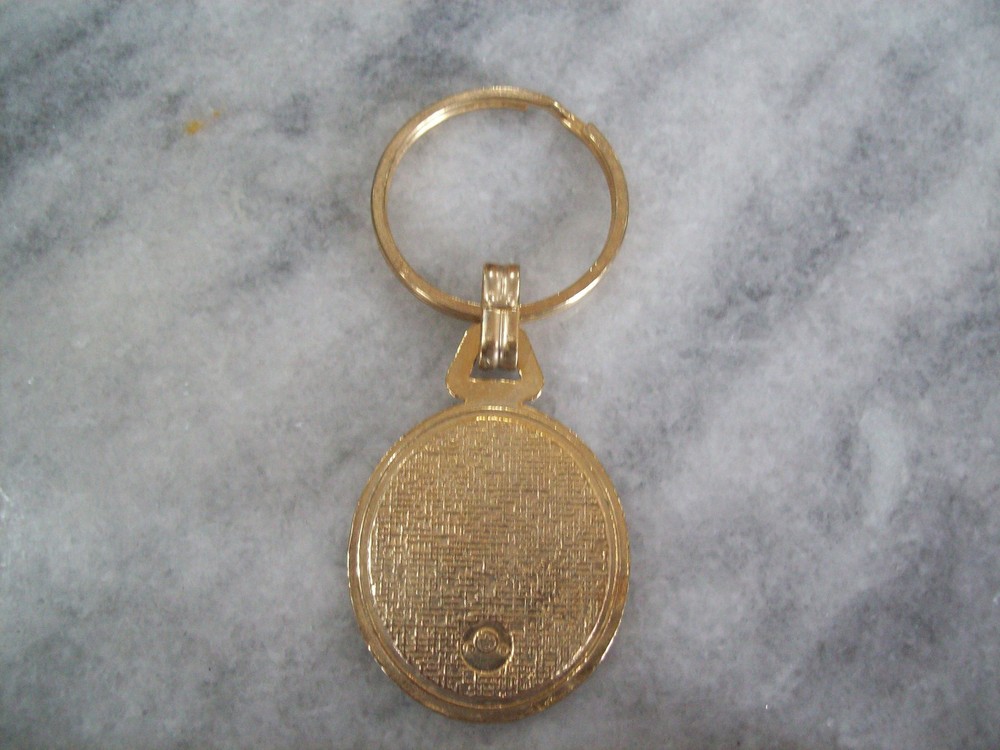 VINTAGE OLDSMOBILE KEY CHAIN .....