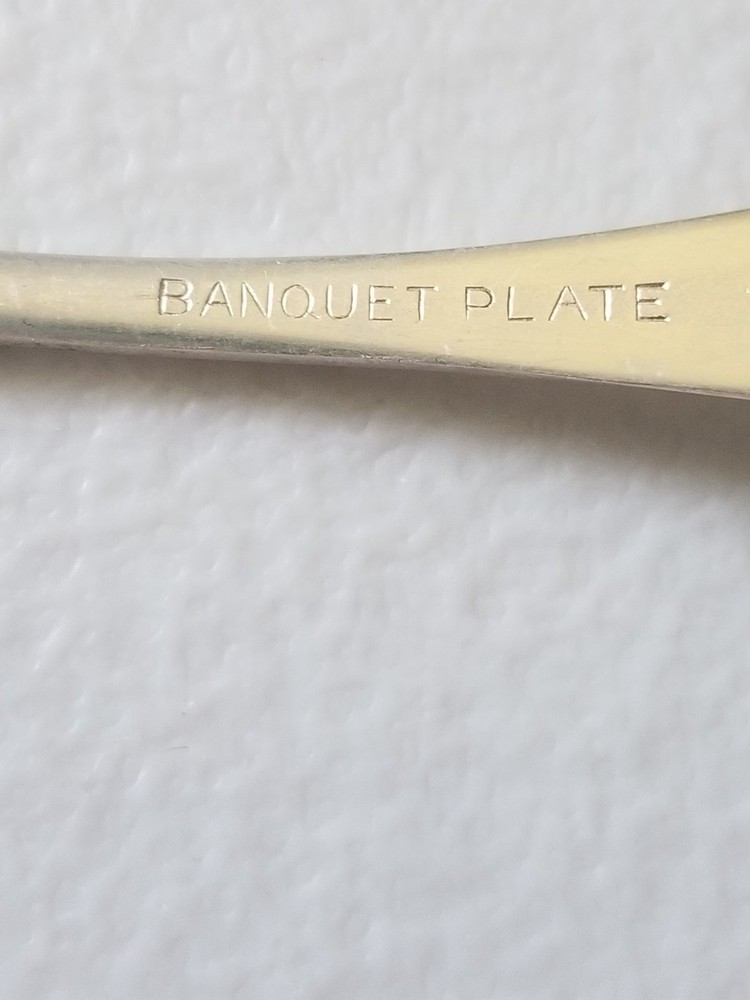 VINTAGE BANQUET PLATE SPOON 4 IN SILVERPLATE