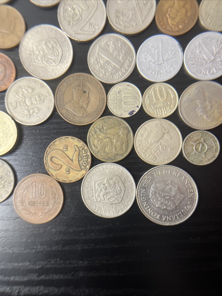 34 International Coins.
