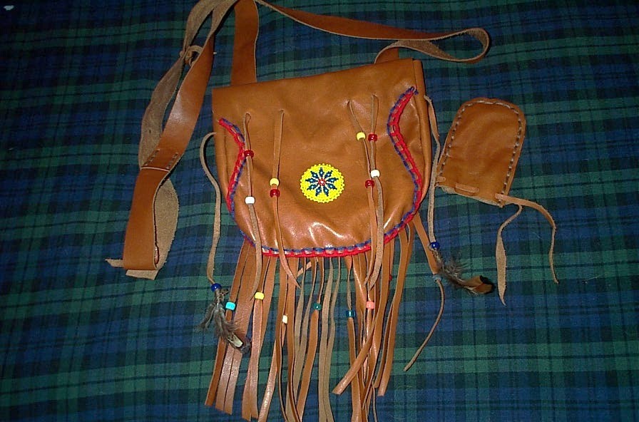 BLACK POWDER, MOUNTAIN MAN , BEAVER TAIL, ROSETTE, LEATHER POSSIBLE BAG