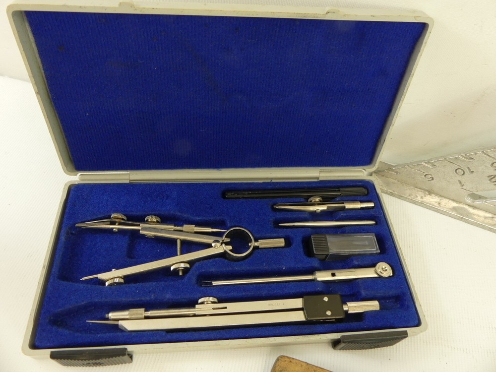 (RefJOH41) Technical drawing tools slide rule compass set square