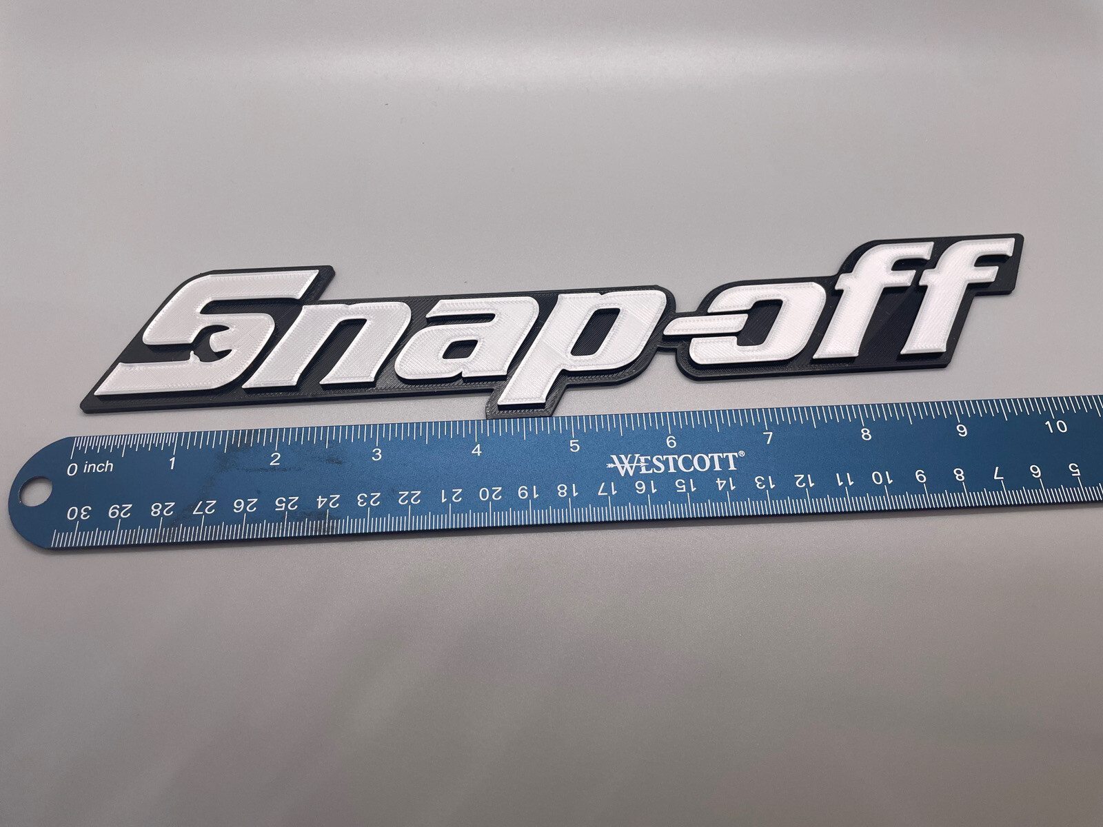 Snap-off Novelty 3D Printed Tool Box Badge.