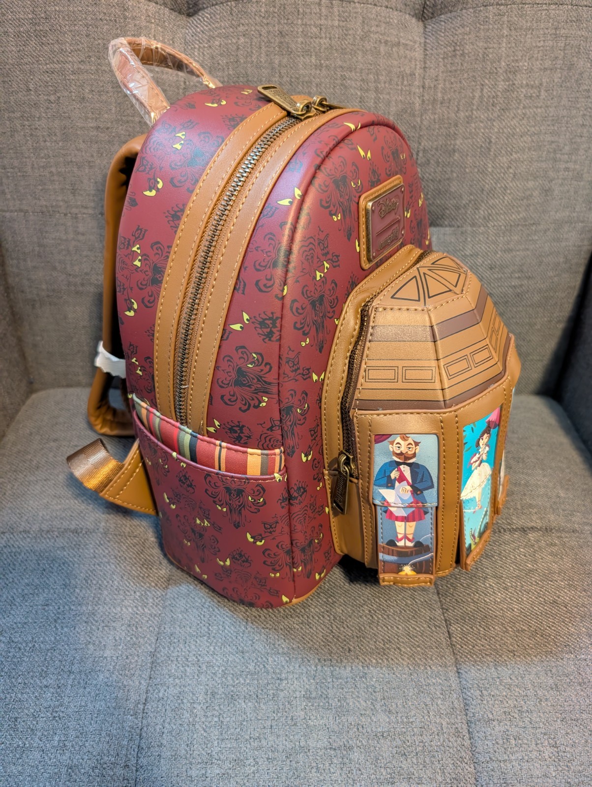 Disney Haunted Mansion Stretching Room Portraits Glow-in-the-Dark Mini Backpack