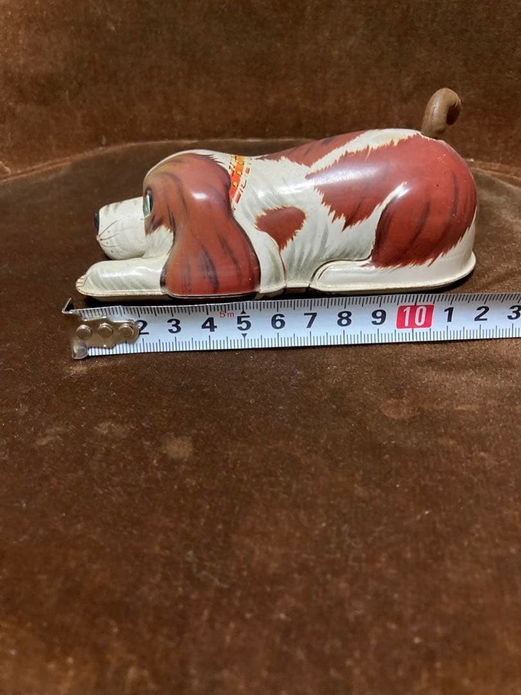 Tin wind-up toy dog