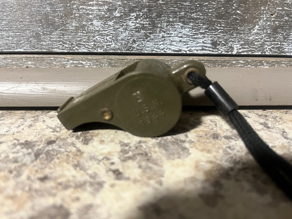 Vintage WW2 U.S. Navy 1944 dated OD Plastic Whistle with Black Lanyard Works!