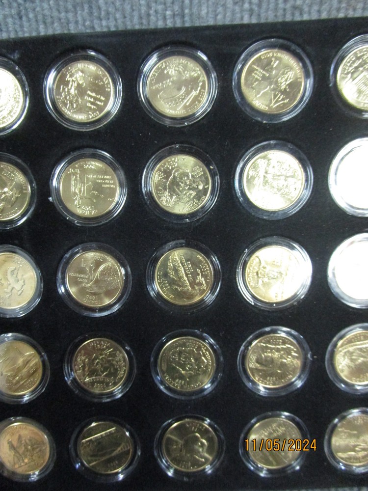 111 Uncirculated Gold State Quarters