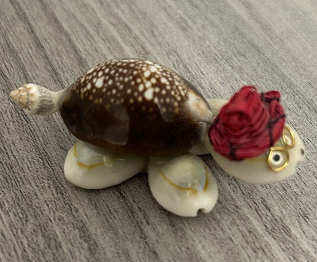 Vintage Turtle Made Of Shells With Red Hat