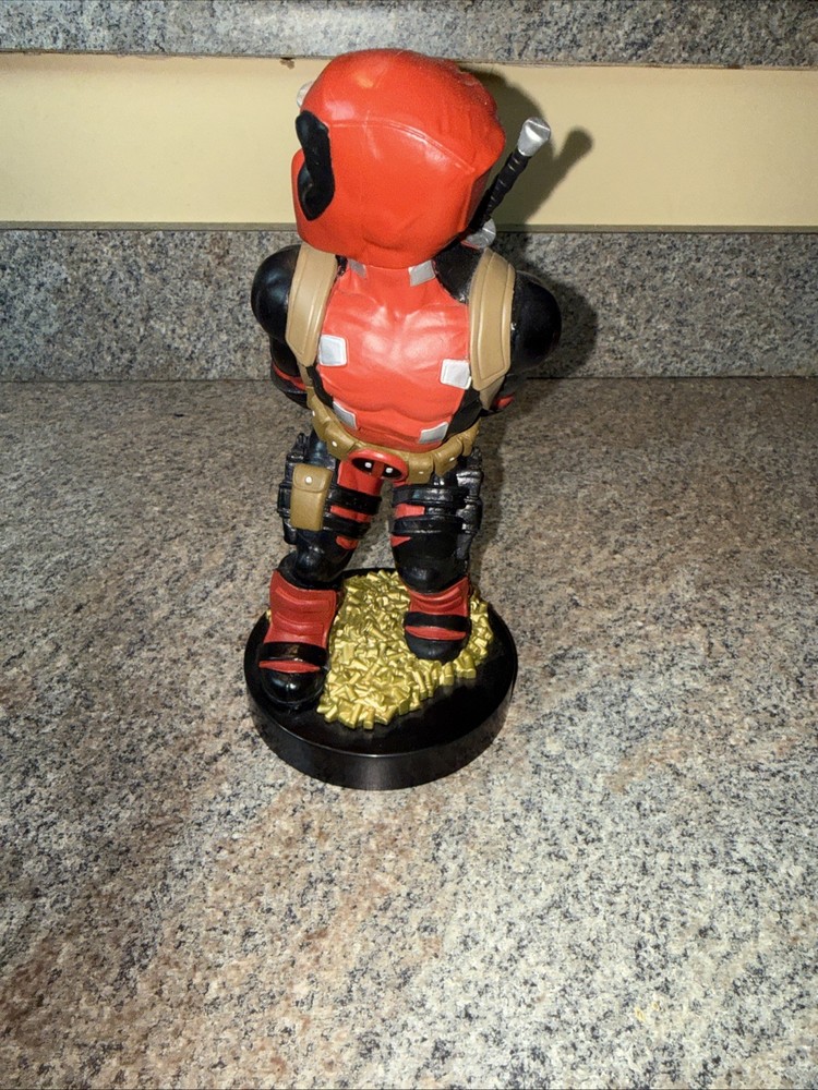 Deadpool controller/phone holder. Marvel Cableguys. Good shape. About 9 " High.