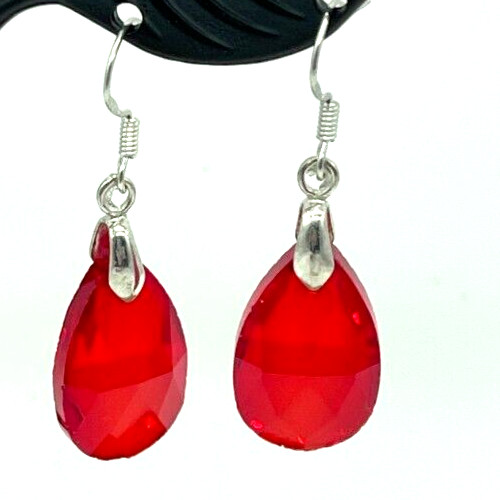 Earrings. Silver tone Large Red Crystals. Hook. 1" drop