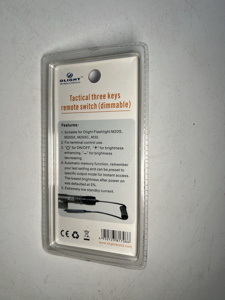 Olight tactical remote switch with keys.