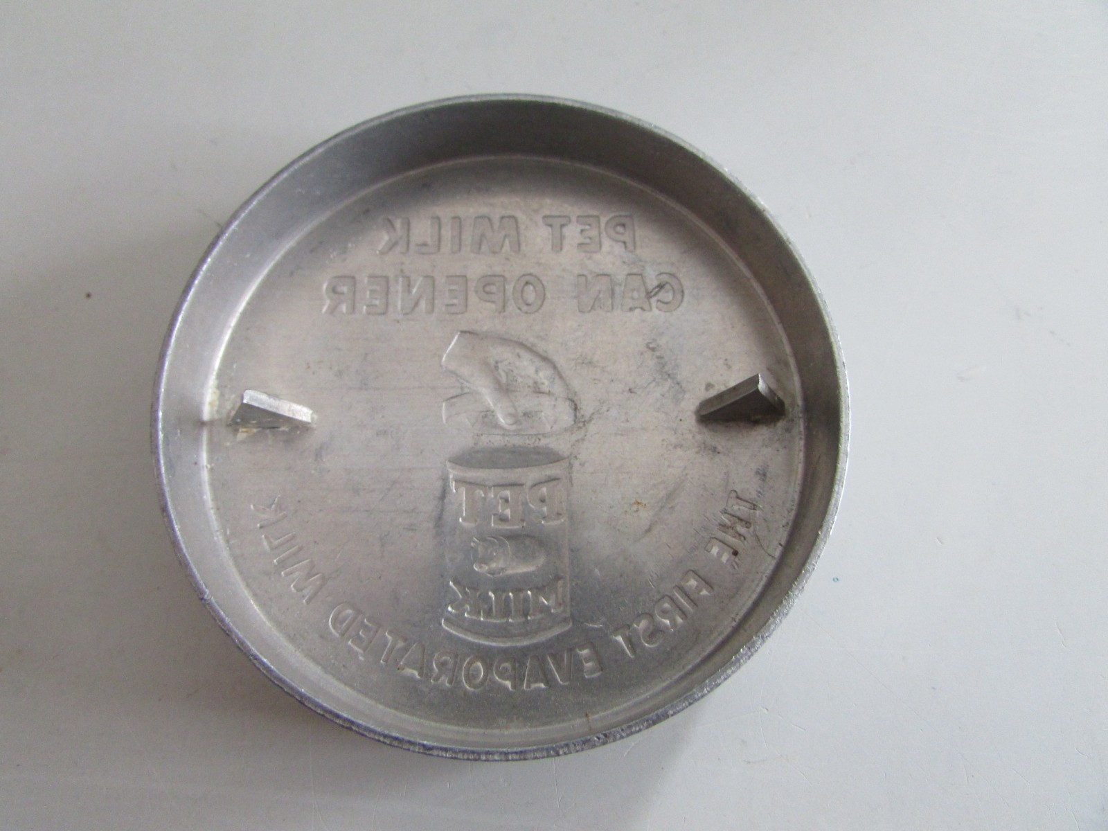 VTG 1940s PET Milk Can Opener Cover THE FIRST EVAPORATED MIILK 3” Aluminum Metal