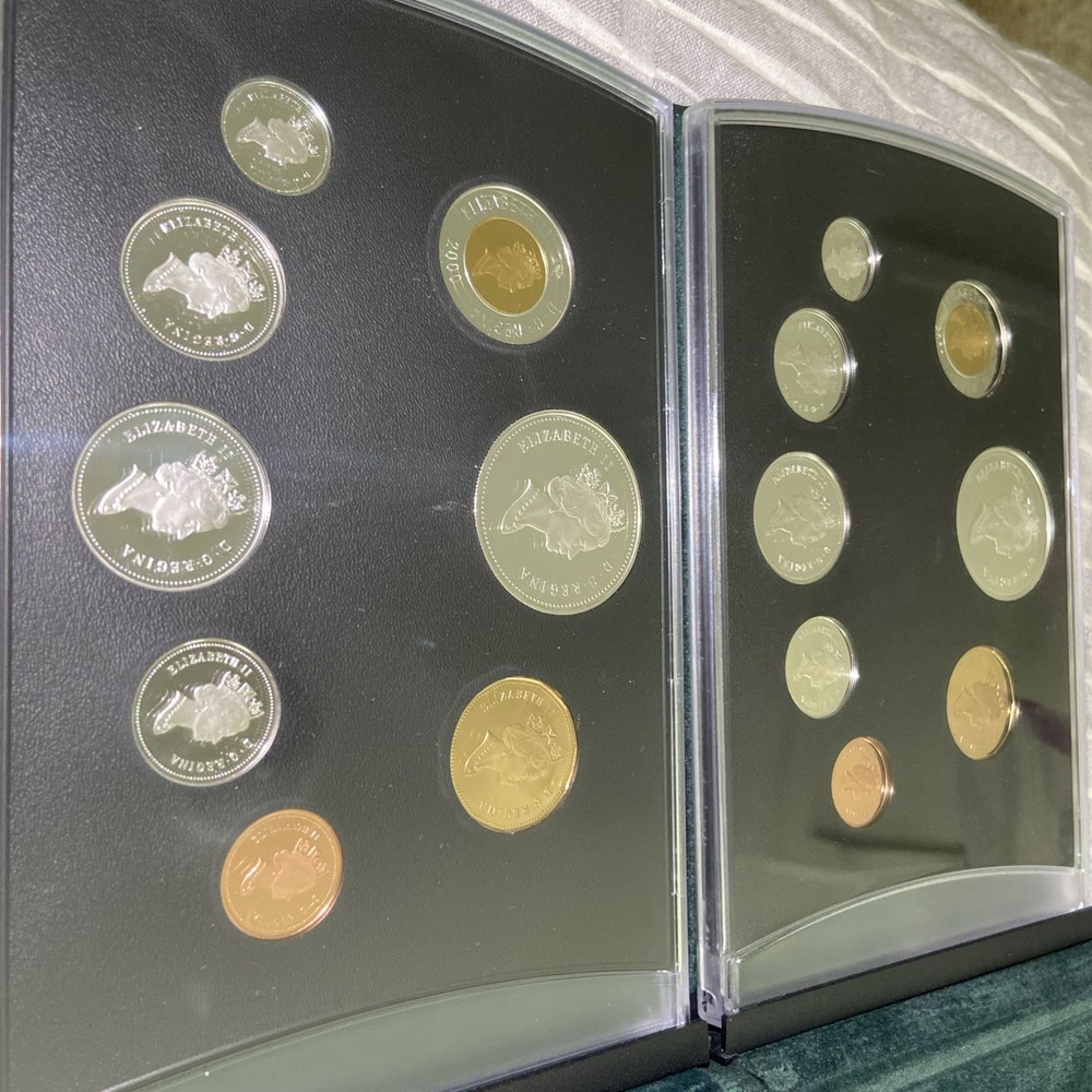 Two 2000 CANADA PROOF SETS WITH COMMEMORATIVE SILVER DOLLARS RCM
