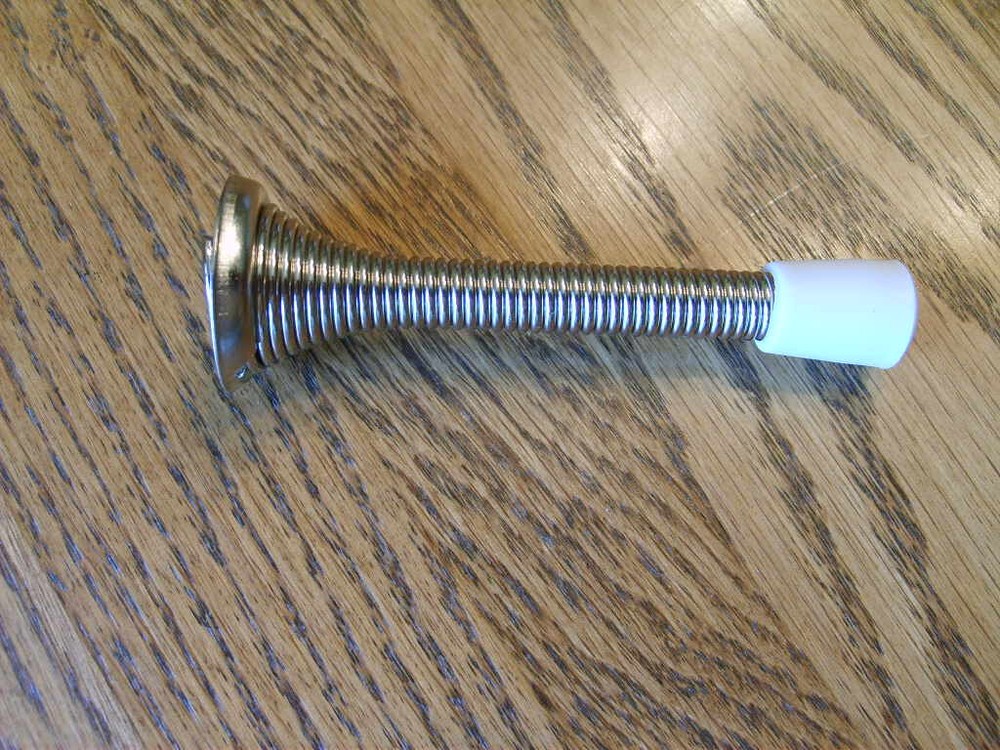 Spring door stop