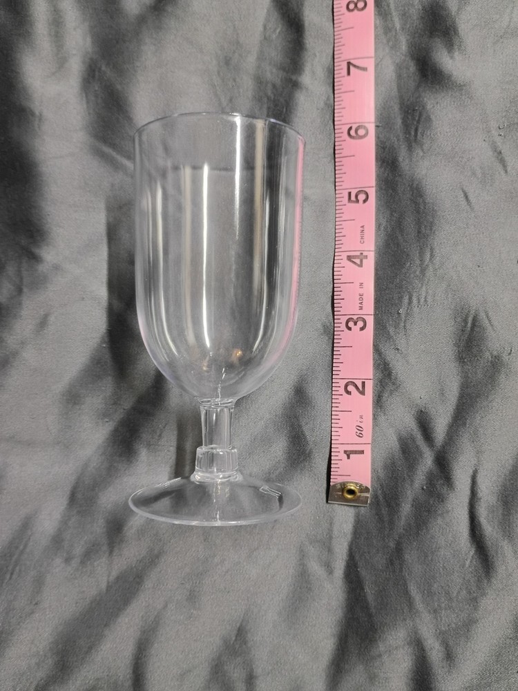 4 setting plastic picnic set plates, silverware, cups