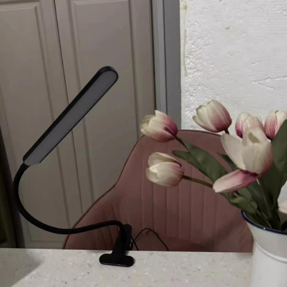 Foldable into a compact USB powered desk lamp gooseneck style
